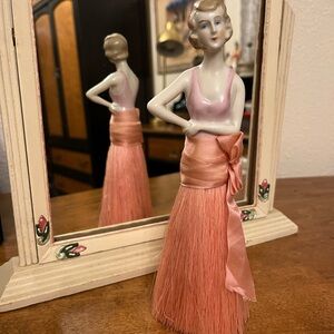 Charming Porcelain Figurine with Peach whisk broom